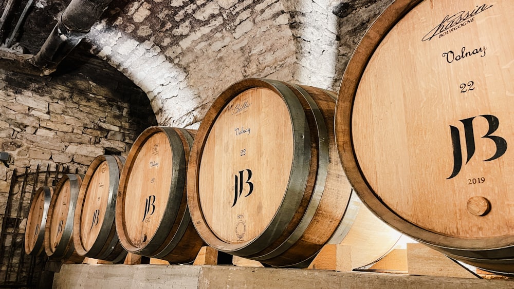 Barrels lined up along the cellar wall